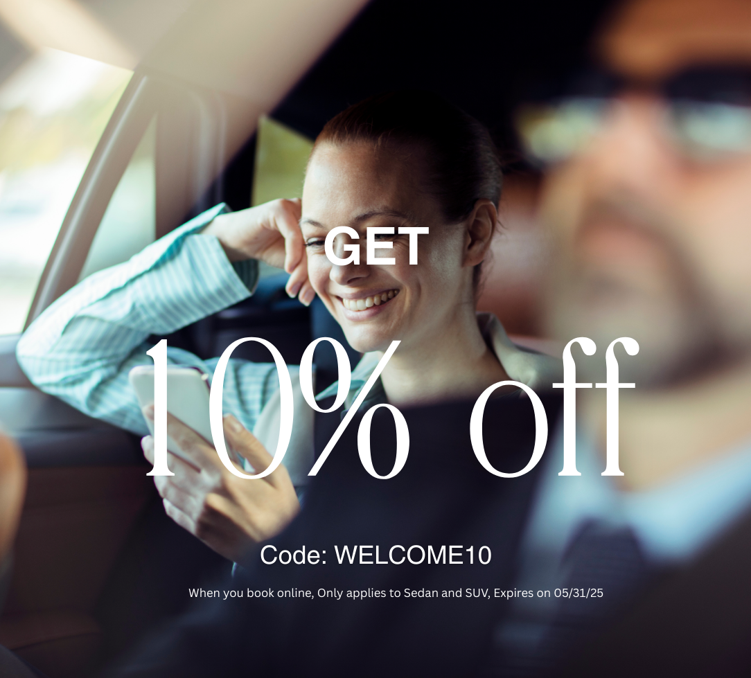 Smiling person in a car looking at a phone, promoting a 10% off discount.